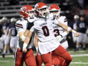 Jared Forner (0) of Camas celebrates after a punt return against Skyview during a 4A Greater St. Helens League football game at Kiggins Bowl on Friday, Nov. 1, 2024.