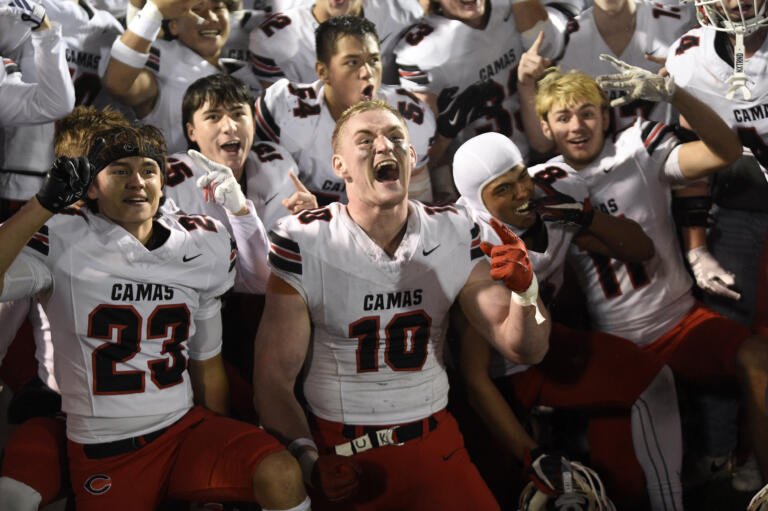 Luke Webb (10) of Camas celebrates with his teammates after beating Skyview in a 4A Greater St. Helens League football game at Kiggins Bowl on Friday, Nov. 1, 2024.