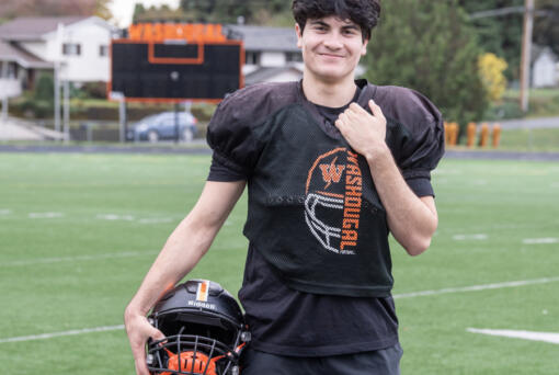 Washougal senior Elijah Franco stands for a portrait Tuesday, Nov. 5, 2024, at Washougal High School. The defensive standout started helping his team&Ccedil;&fnof;&Ugrave;s offense midway through the season when he began taking snaps at quarterback and running back.