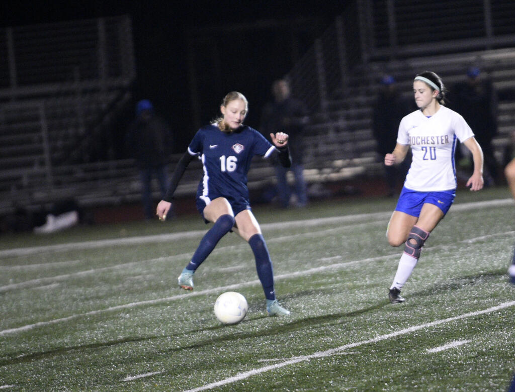 Shaylie Haij (16) of King's Way Christian controls the ball in front of Kaitlyn Black (20) of Rochester during a Class 1A girls soccer district playoff game at King's Way Christian School on Tuesday, Nov. 5, 2024.