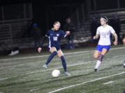 Shaylie Haij (16) of King's Way Christian controls the ball in front of Kaitlyn Black (20) of Rochester during a Class 1A girls soccer district playoff game at King's Way Christian School on Tuesday, Nov. 5, 2024.