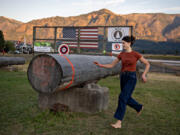 U.S. Rep. Marie Gluesenkamp Perez runs to the finish line while taking part in the women&rsquo;s obstacle pole event at last summer&rsquo;s Skamania County Timber Carnival in Stevenson.