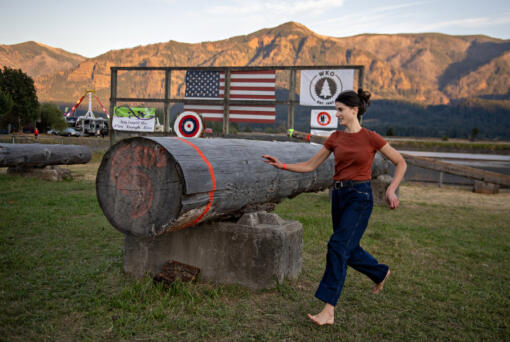 U.S. Rep. Marie Gluesenkamp Perez runs to the finish line while taking part in the women&rsquo;s obstacle pole event at last summer&rsquo;s Skamania County Timber Carnival in Stevenson.