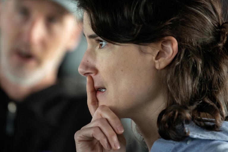 U.S. Rep. Marie Gluesenkamp Perez listens to crew members aboard the Yaquina dredging vessel while taking a tour along the Columbia River in August.