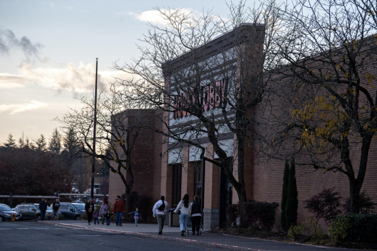 Shoppers swing by Vancouver Mall two weeks after the Oct. 31 shooting there.