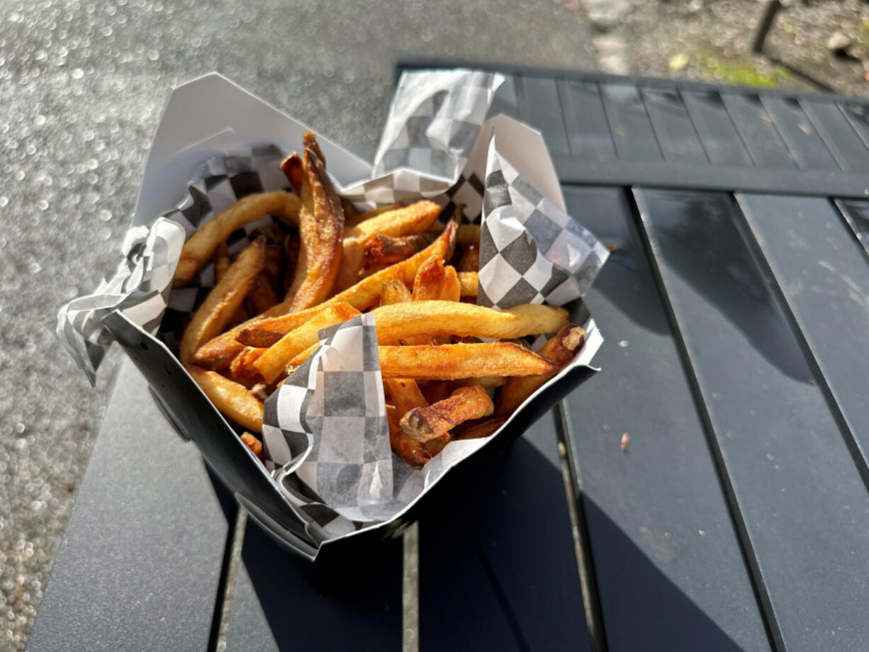 The hand-cut Idaho potato fries at Smashed Cheese are fried two times.