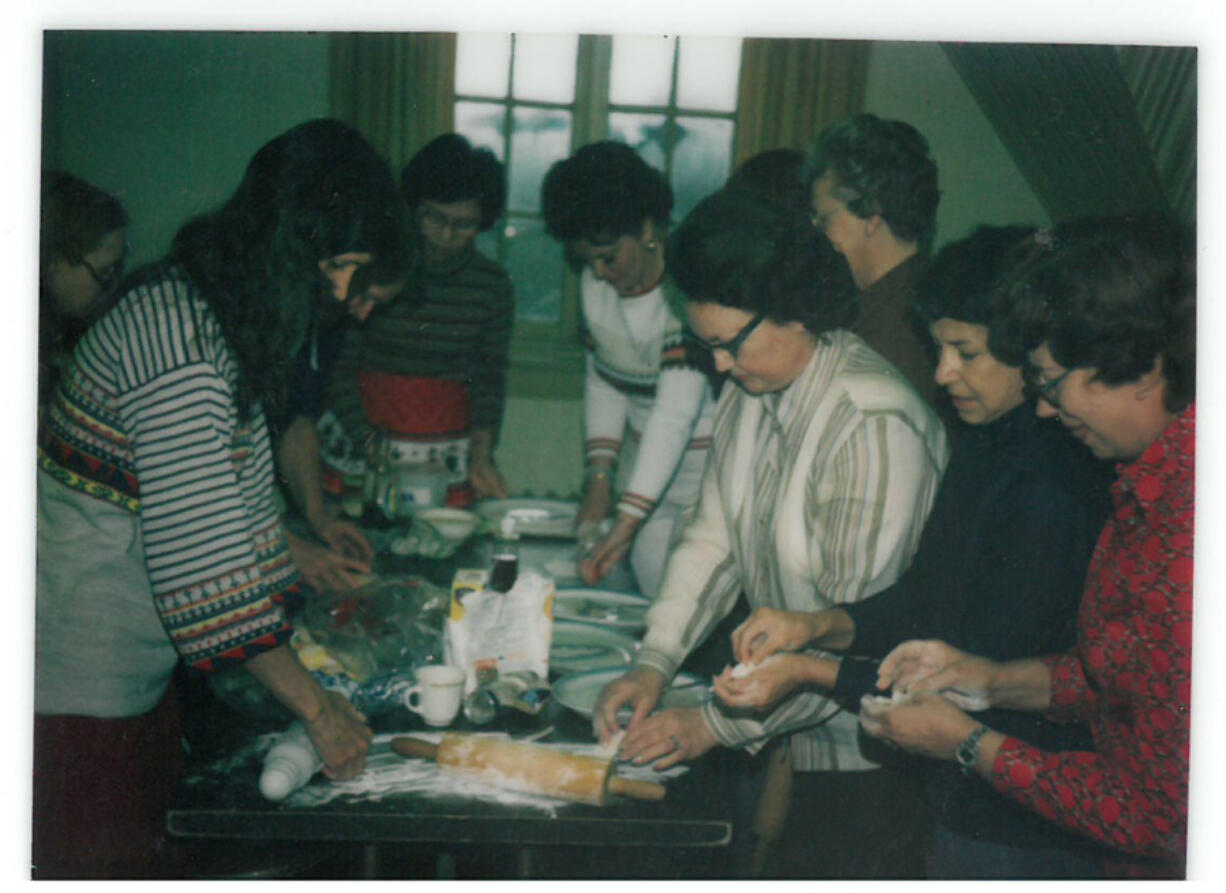 Volunteers from YWCA Clark County prepare a meal together in the 1980s. The YWCA is celebrating 50 years of its Safe Choice Program, which provides shelter, housing and other resources to people who have experienced domestic violence.