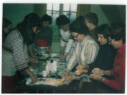 Volunteers from YWCA Clark County prepare a meal together in the 1980s. The YWCA is celebrating 50 years of its Safe Choice Program, which provides shelter, housing and other resources to people who have experienced domestic violence.