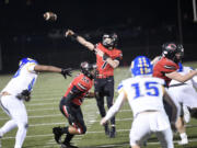 Jake Davidson (7) of Camas throws a touchdown pass to against Stadium in a 4A state preliminary football game at Doc Harris Stadium in Camas on Friday, Nov. 8, 2024.