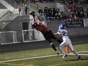 Nikko Speer (43) of Camas pulls in a touchdown pass in front of Braeden Rucks of Stadium in a 4A state preliminary football game at Doc Harris Stadium in Camas on Friday, Nov. 8, 2024.