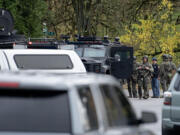 Law enforcement officers respond to the scene of a shooting in Camas on Thursday morning, Nov. 14, 2024.