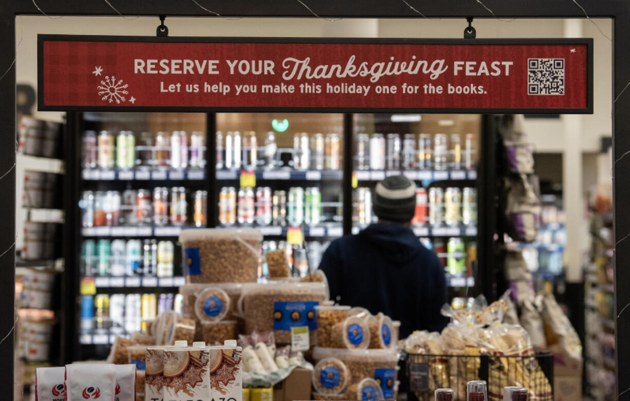 Customers shop at the New Seasons Market in east Vancouver the week before Thanksgiving.