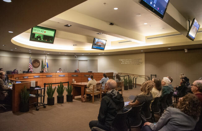 Residents speak to the Vancouver City Council on Monday during a Vancouver City Council meeting.