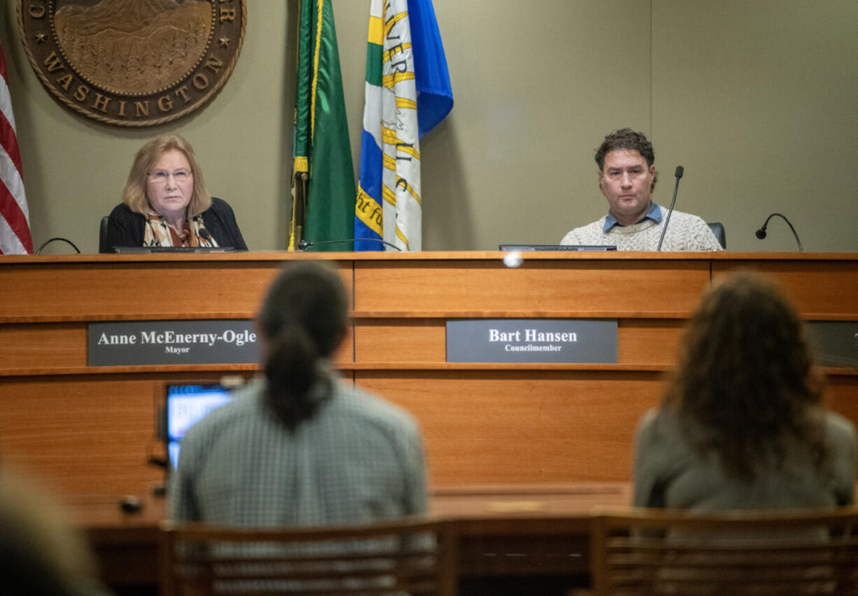 Vancouver Mayor Anne McEnerny-Ogle, left, and Councilor Bart Hansen listen to public testimony in November during a Vancouver City Council meeting.