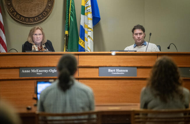 Vancouver Mayor Anne McEnerny-Ogle, left, and Councilor Bart Hansen listen to public testimony in November during a Vancouver City Council meeting.