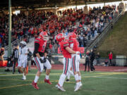 Camas players celebrate a touchdown Saturday, Nov. 30, 2024, during the Papermakers’ 28-20 win against Gonzaga Prep in a semifinal playoff game at McKenzie Stadium.