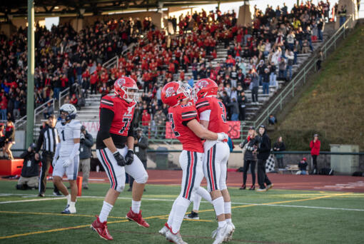 Camas players celebrate a touchdown Saturday, Nov. 30, 2024, during the Papermakers’ 28-20 win against Gonzaga Prep in a semifinal playoff game at McKenzie Stadium.