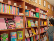 A customer browses the romance selections at Kiss &amp; Tale in Collingswood, N.J.