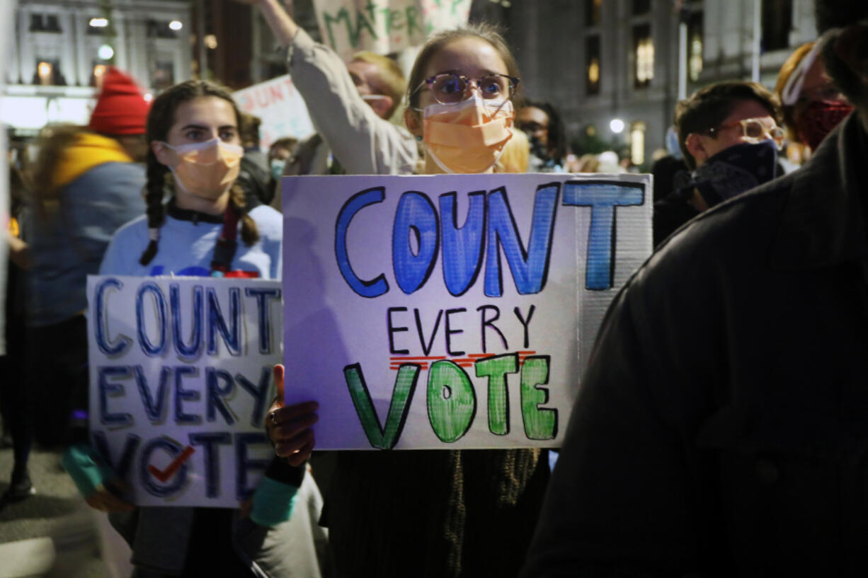 People participate in a protest in support of counting all votes as the election in Pennsylvania is still unresolved on Nov. 4, 2020, in Philadelphia, Pennsylvania. With no winner declared in the presidential election so far, all eyes are on the outcome in a few remaining swing states to determine whether Donald Trump will get another four years or Joe Biden will become the next president of the United States. The counting of ballots in Pennsylvania continues with no winner yet announced.