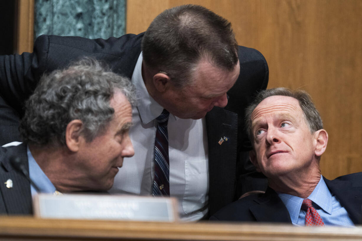 From left, Chairman Sherrod Brown, D-Ohio, Sen. Jon Tester, D-Mont., and ranking member Sen. Pat Toomey, R-Pa., are seen as Treasury Secretary Janet Yellen testified during the Senate Banking, Housing, and Urban Affairs Committee hearing titled The Financial Stability Oversight Council Annual Report to Congress, in Dirksen Senate Office Building in Washington on May 10, 2022 in Washington, DC.