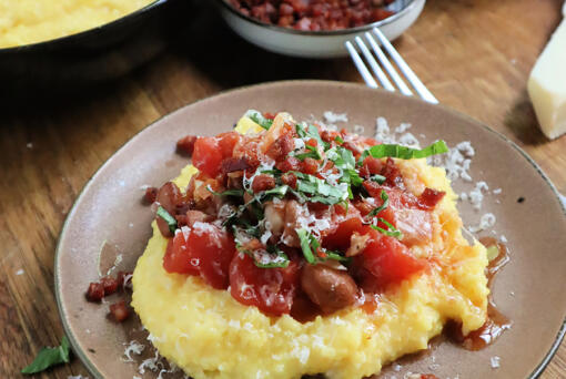 Cranberry beans simmered with tomato are a perfect match for a soft bed of cheesy polenta.