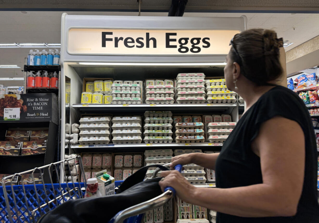 A customer walks by a display of fresh eggs at a grocery store on Sept. 25in San Anselmo, Calif. According to the Bureau of Labor Statistics, egg prices have surged over 28 percent in August largely due to avian influenza (HPAI), also known as bird flu. Nearly 101 million birds have been impacted by bird flu since 2022 which has significantly lowered the number of eggs being produced.