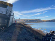 A train carrying frozen French fries derailed south of Wallula spilling around 1,400 gallons of diesel into the Columbia River.