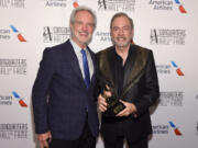 Bob Gaudio, left, and Neil Diamond pose backstage during the Songwriters Hall of Fame 49th Annual Induction and Awards Dinner at New York Marriott Marquis Hotel on June 14, 2018, in New York.