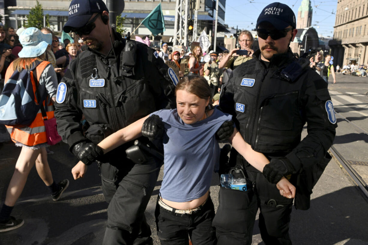 Swedish climate activist Greta Thunberg is carried away by police after she attended the &ldquo;Storm Warning&rdquo; demonstration by Extinction Rebellion Finland in Helsinki, Finland on June 25, 2024.