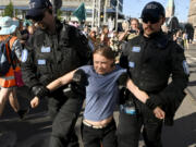 Swedish climate activist Greta Thunberg is carried away by police after she attended the &ldquo;Storm Warning&rdquo; demonstration by Extinction Rebellion Finland in Helsinki, Finland on June 25, 2024.