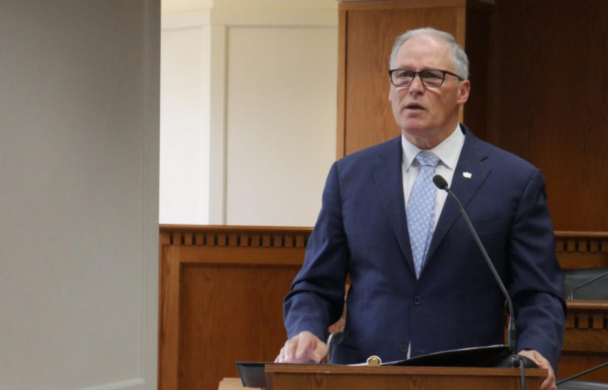 Gov. Jay Inslee speaks to members of the press on Jan. 4, ahead of the 2024 Washington state legislative session.