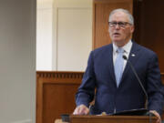 Gov. Jay Inslee speaks to members of the press on Jan. 4, ahead of the 2024 Washington state legislative session.