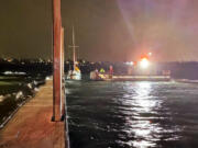 Vancouver Fire Boat 1 was required to rescue a man and his dog off a 32-foot sailboat in the Columbia River on Tuesday because of storm conditions.