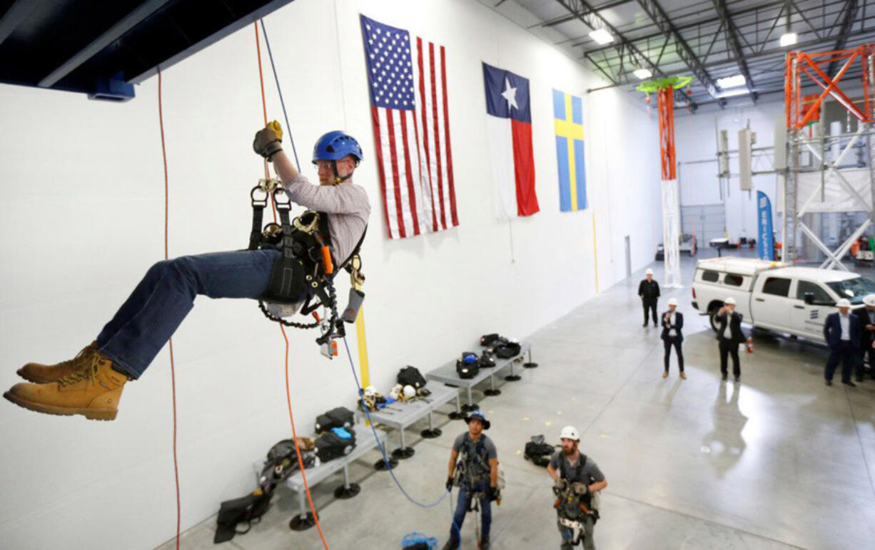 FCC commissioner Brendan Carr did a controlled descent while touring Swedish telecom company Ericsson&rsquo;s tower training facility in Lewisville, Texas, in 2019.