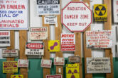 Historical hazardous signs shown at the B Reactor at the Hanford site  on Wednesday, Oct. 12, 2022. The B Reactor was the first full-scale plutonium production reactor in the world.