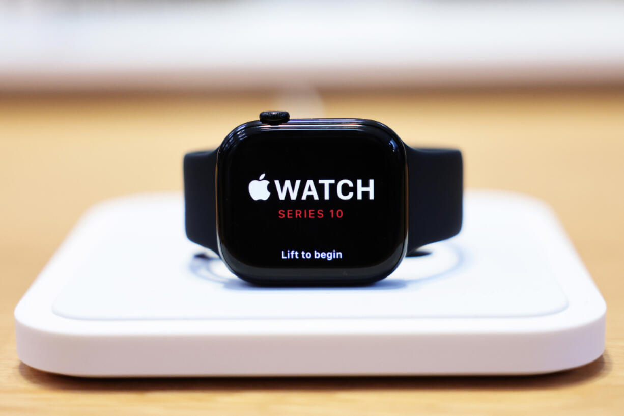 An Apple Watch is on display Sept. 20 at the Fifth Avenue Apple Store in New York City. (Michael M.