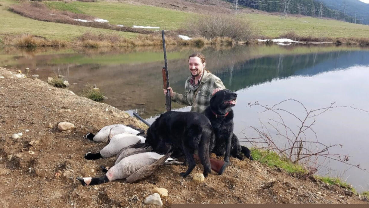 Jeff Otto of Sandy, Oregon, shows off a few Canada geese taken while hunting private land. Geese have been harder to find than usual this fall.