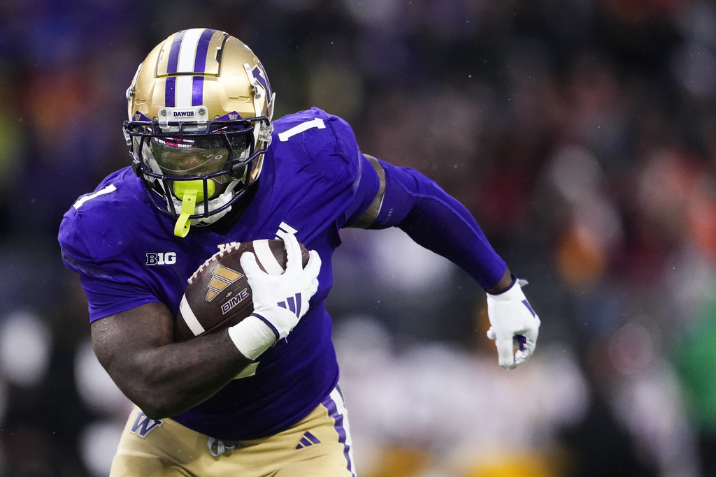 Washington running back Jonah Coleman runs the ball on his way to a touchdown against Southern California during the first half of an NCAA college football game Saturday, Nov. 2, 2024, in Seattle.