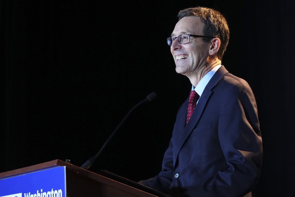 Democratic Washington gubernatorial candidate Attorney General Bob Ferguson smiles while speaking at the Washington State Democrats watch party on Election Day, Tuesday, Nov. 5, 2024, in Seattle.