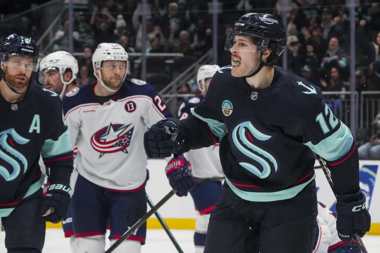 Seattle Kraken left wing Tye Kartye celebrates his goal against the Columbus Blue Jackets during the second period of an NHL hockey game Tuesday, Nov. 12, 2024, in Seattle.