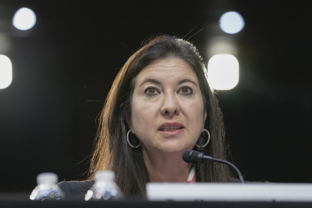 FILE - Adriana Kugler of Maryland, speaks during the Senate Banking, Housing, and Urban Affairs Committee hearing to examine her nomination to be a member of the Board of Governors of the Federal Reserve System, June 21, 2023, on Capitol Hill in Washington.