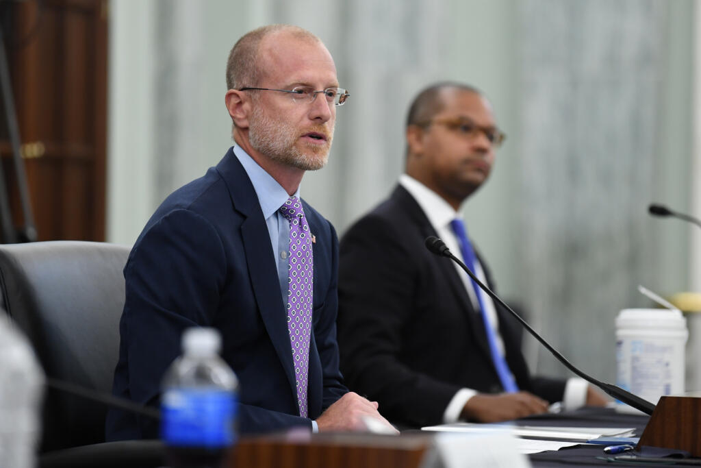 FILE - Brendan Carr answers questions during a Senate Commerce, Science, and Transportation committee hearing to examine the Federal Communications Commission on Capitol Hill in Washington, June 24, 2020.