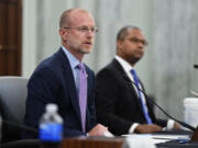 FILE - Brendan Carr answers questions during a Senate Commerce, Science, and Transportation committee hearing to examine the Federal Communications Commission on Capitol Hill in Washington, June 24, 2020.