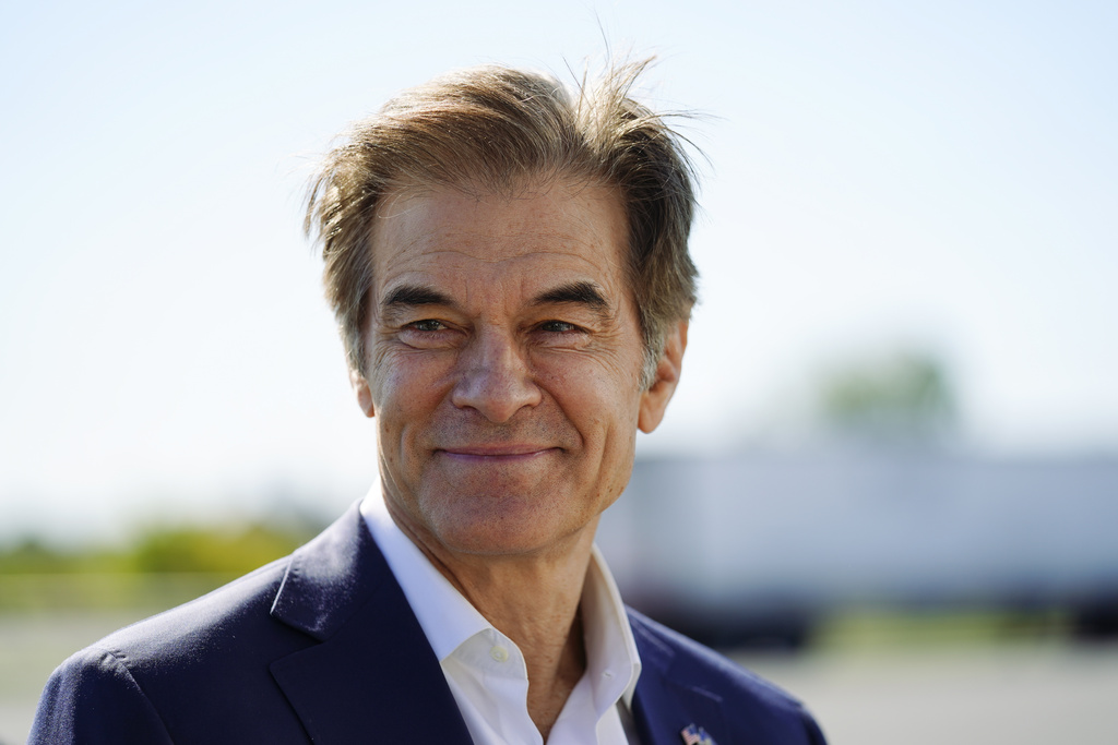 FILE - Mehmet Oz visits the AW Driving School &amp; License Testing Center in Allentown, Pa., Sept. 23, 2022.