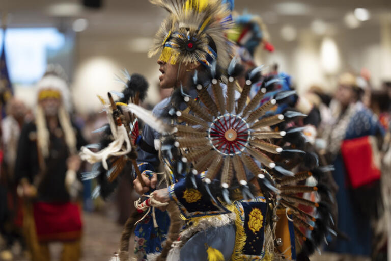 People dance during a powwow at Chinook Winds Casino Resort, Saturday, Nov. 16, 2024, in Lincoln City, Ore.