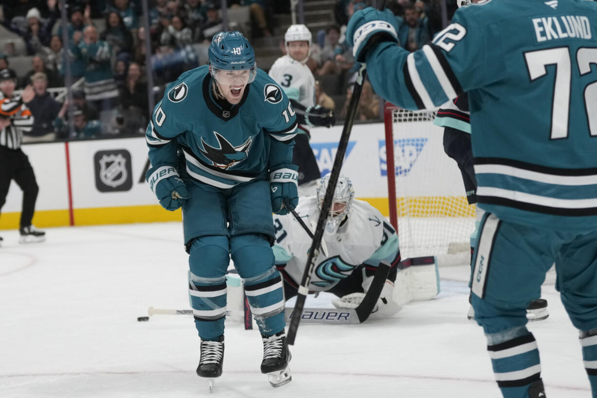 San Jose Sharks center Klim Kostin (10) celebrates after scoring against the Seattle Kraken during the first period of an NHL hockey game in San Jose, Calif., Friday, Nov. 29, 2024.