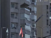 A bomb dropped from an Israeli jet hits a building in Tayouneh, Beirut, Lebanon, Friday, Nov. 15, 2024.