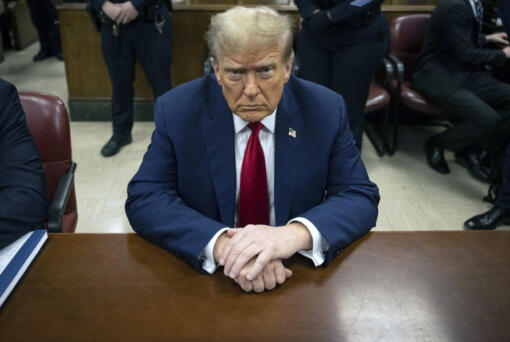 Former President Donald Trump waits for the start of proceedings in Manhattan criminal court, Tuesday, April 23, 2024, in New York. Before testimony resumes Tuesday, the judge will hold a hearing on prosecutors&rsquo; request to sanction and fine Trump over social media posts they say violate a gag order prohibiting him from attacking key witnesses.