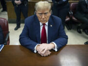 President-elect Donald Trump waits for the start of proceedings in Manhattan criminal court April 23 in New York.