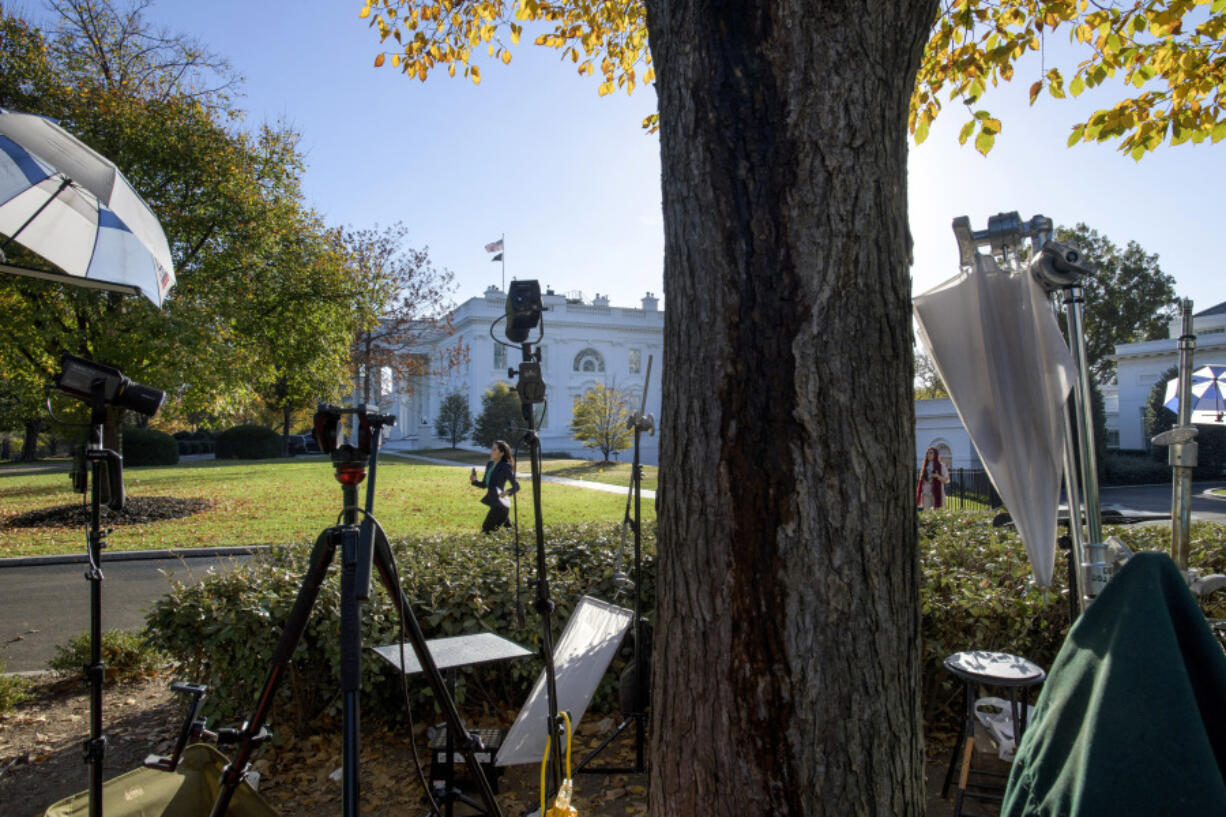 Reporters prepare for work at the White House post-Election Day, Wednesday, November 6, 2024, in Washington.